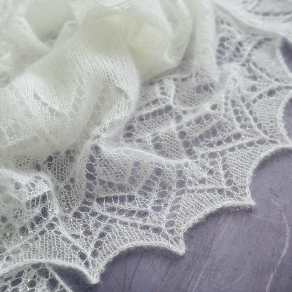 Detail of Ammil shawl with mohair, beads and a lace edge