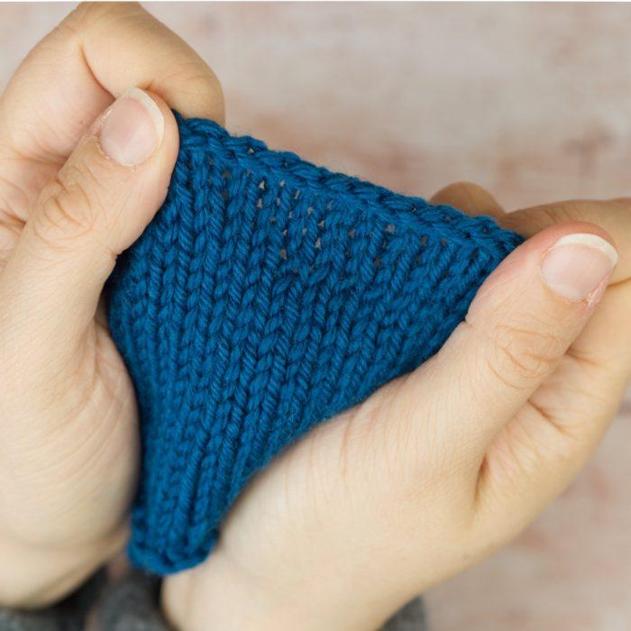 Finished Icelandic Bind Off on blue knitting
