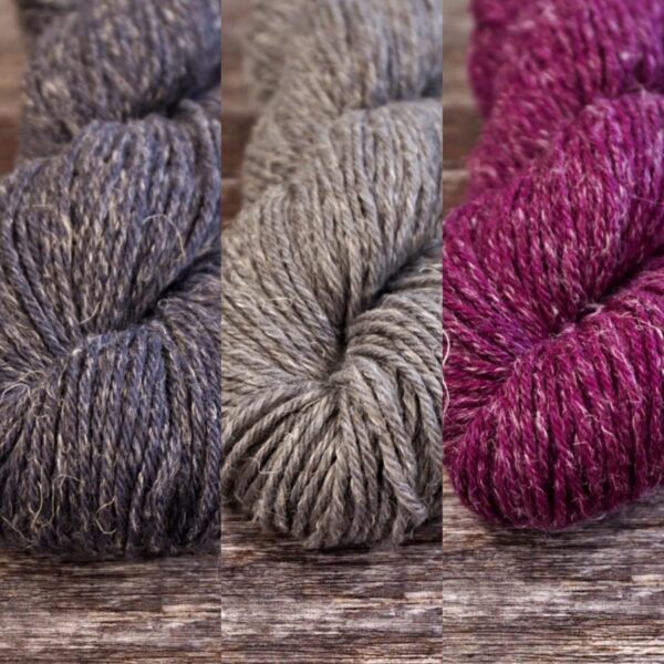 Cafe Flamingo yarn selection in dark and mid grey and a magenta pink