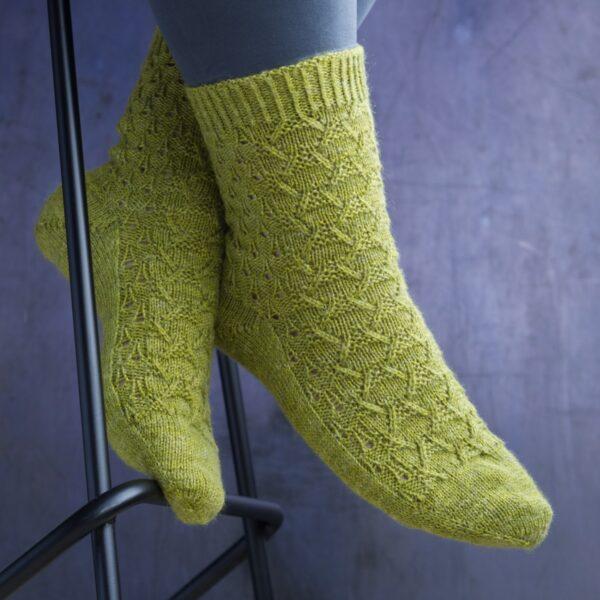 Spring green socks with Eiffel tower textures