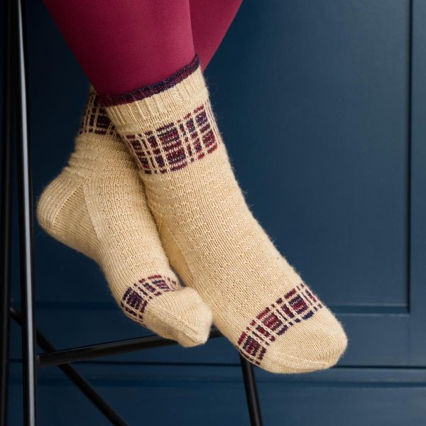 shortbread themed socks with a tartan ribbon