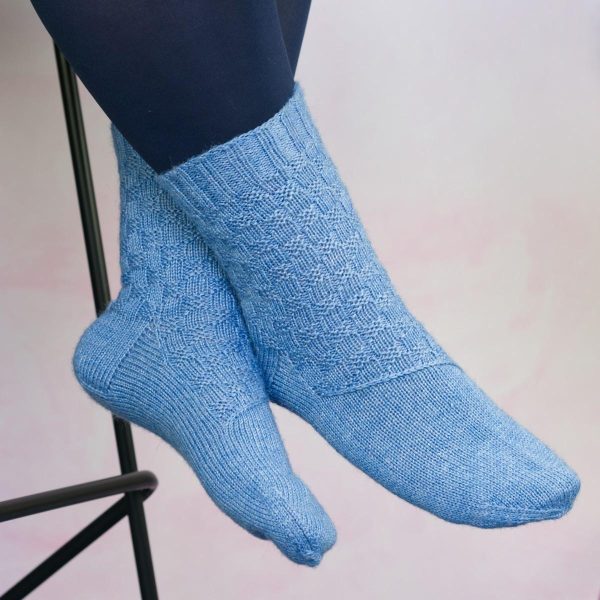 mid blue texture sock with diagonal band across arch