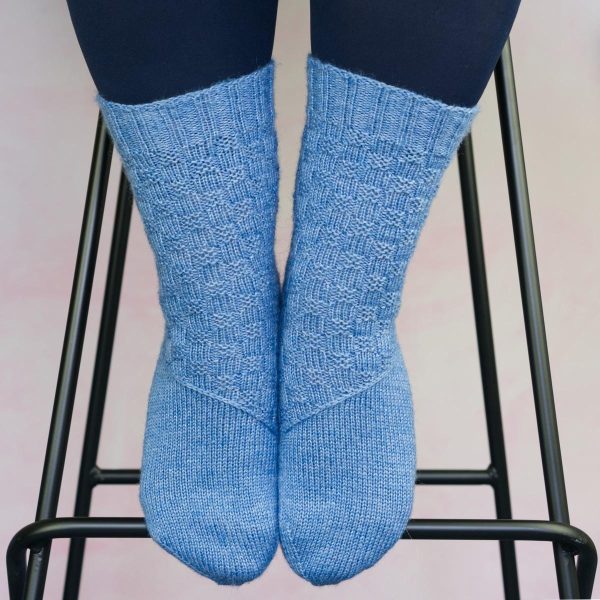 mid blue texture sock with diagonal band across arch