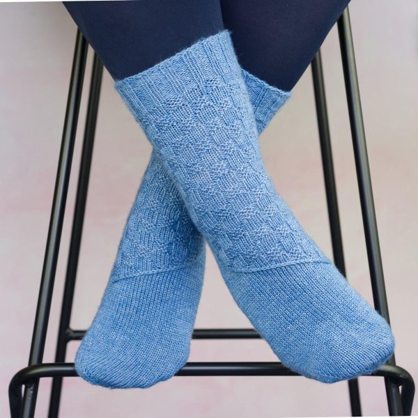 crossed feet mid blue texture sock with diagonal band across arch