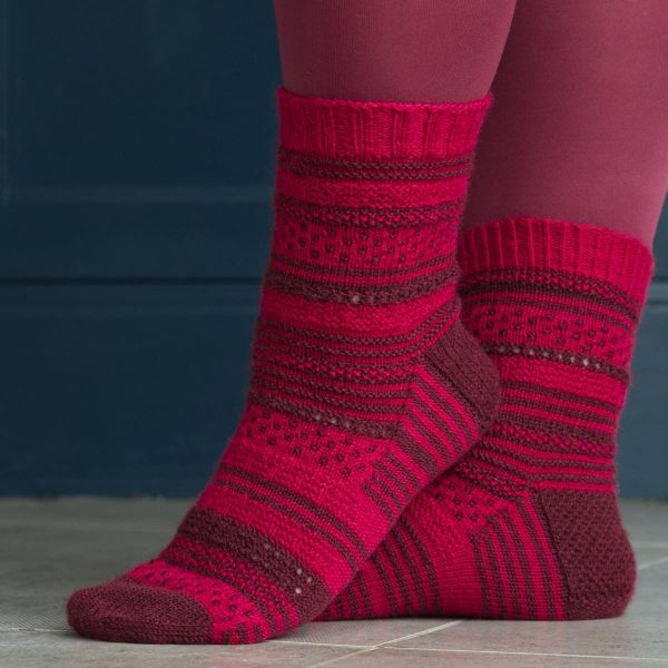 red and burgundy socks with texture and dot fabric